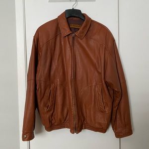 Vintage light brown leather jacket size large.